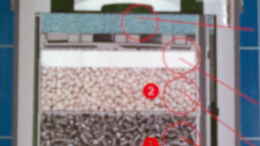 Foto mit Filterquerschnitt (von unten nach oben: Heizmodul, Filterkorb1,