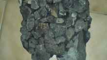 Wandmodul aus Basaltgestein hinter dem der HMF versteckt ist