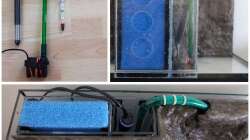 Filtergehäuse mit Filtermatte, Heizstab und Pumpe werden hinter der Rückwand eingesetzt.